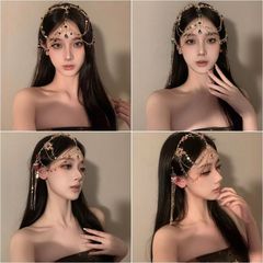 西域敦煌の王女の風情の時代劇のフリンジの額は眉毛の心の古風な漢の服の頭の装飾の異域の写真を撮って髪を飾って復古します。