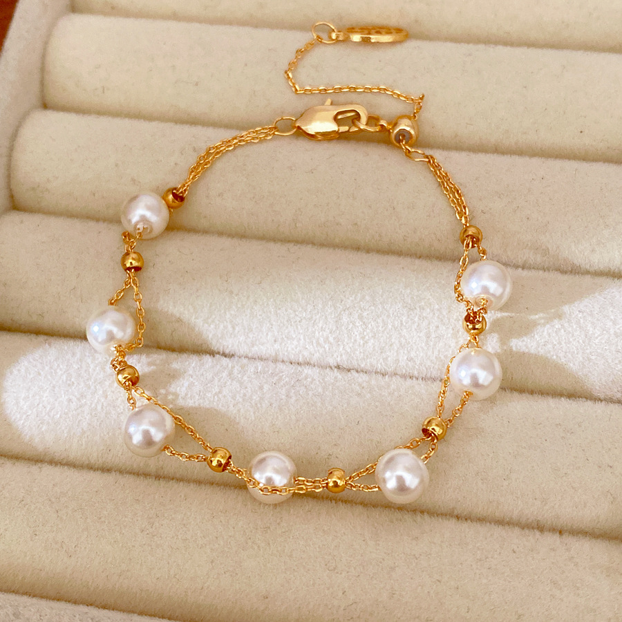 18k oro real chapado perlas de doble capa cruzada pulsera de extracción ligera pulsera de nicho de lujo personalidad joyas de mano mujer image 7