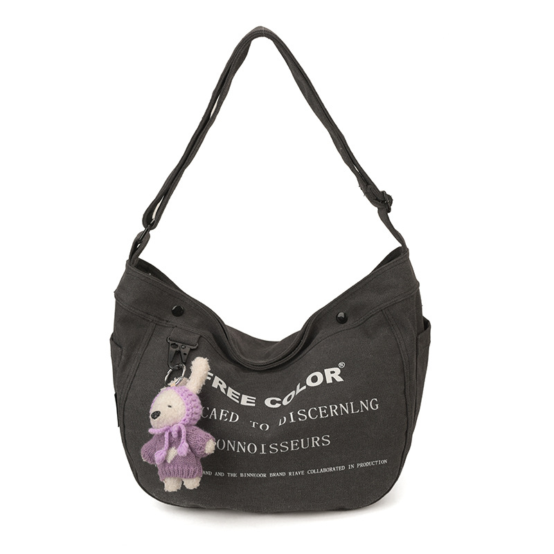 Bolsa de lona para mujeres 2026 nueva bolsa de gran capacidad transfronteriza impresa letras de viaje casual mochila de hombro