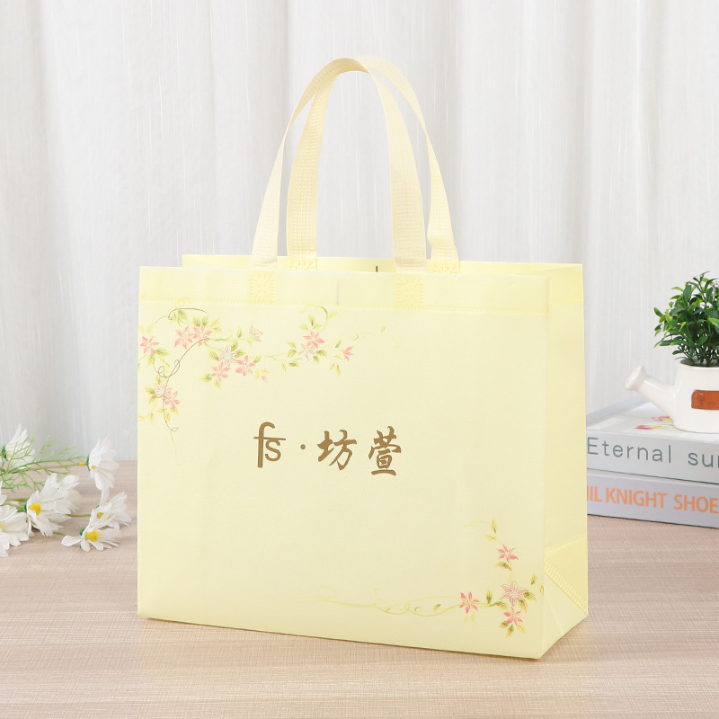 Bolsas de regalo portátiles no tejidas publicidad bolsa de embalaje para llevar bolsas de embalaje UV color impresión de alimentos bolsa de compras al por mayor