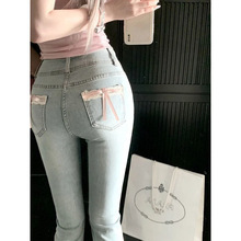 甜美蝴蝶结微喇叭牛仔裤女2024冬季新款修身高腰显瘦提臀喇叭长裤