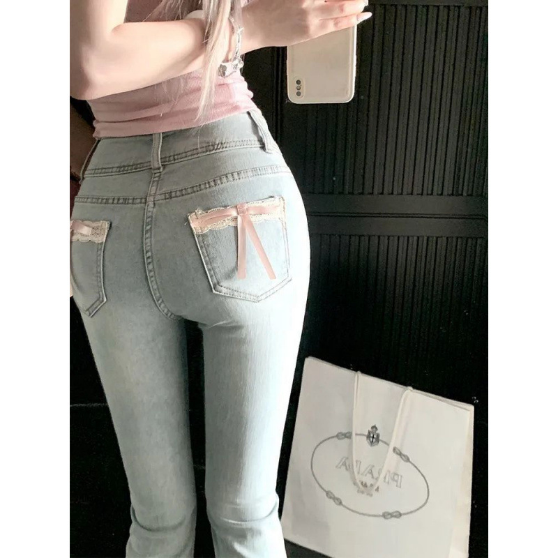 甜美蝴蝶结微喇叭牛仔裤女2024冬季新款修身高腰显瘦提臀喇叭长裤
