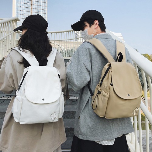 A niche design women's original Japanese lightweight short-distance travel backpack with large capacity, suitable for students and men as a computer and school bag.