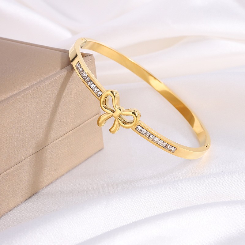 Bracelet * gold with bow