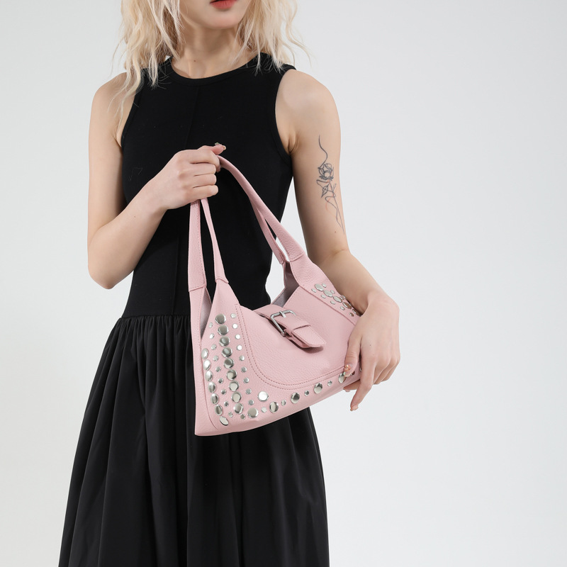 Bolso de axila con textura transfronteriza 2025 primavera y verano nuevo bolso femenino bolso retro con patrón de lichi bolso de hombro con remaches personalizado