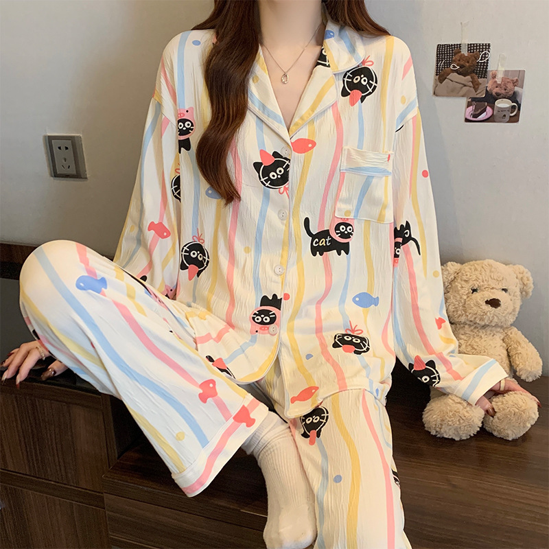 蝶結びのさくらんぼのプリントの女性のパジャマの春と秋の新型のカーディガンの長袖のズボンの部屋の服のスーツは実際に卸売りをたたきます。|undefined