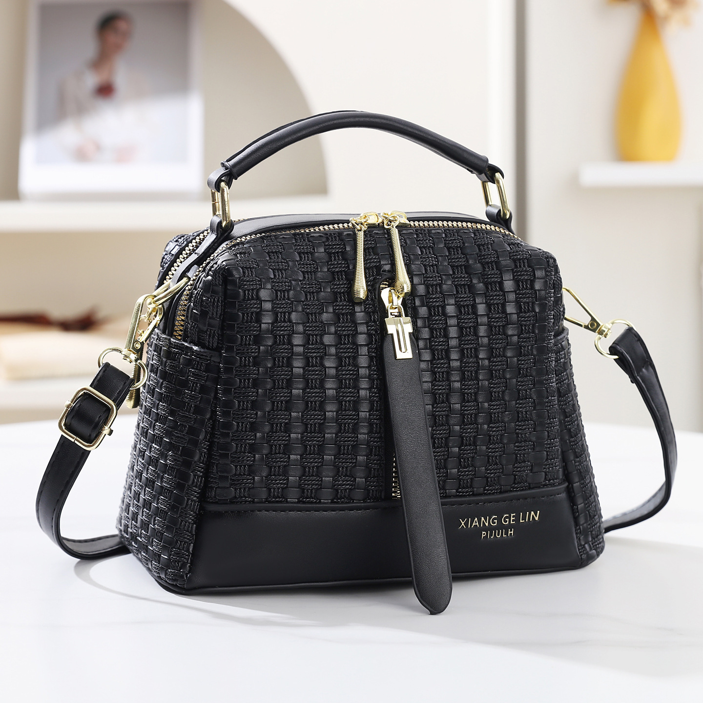 2026 nuevo temperamento de moda tejido bolso de mano textura casual mochila de hombro de gran capacidad bolso de viaje