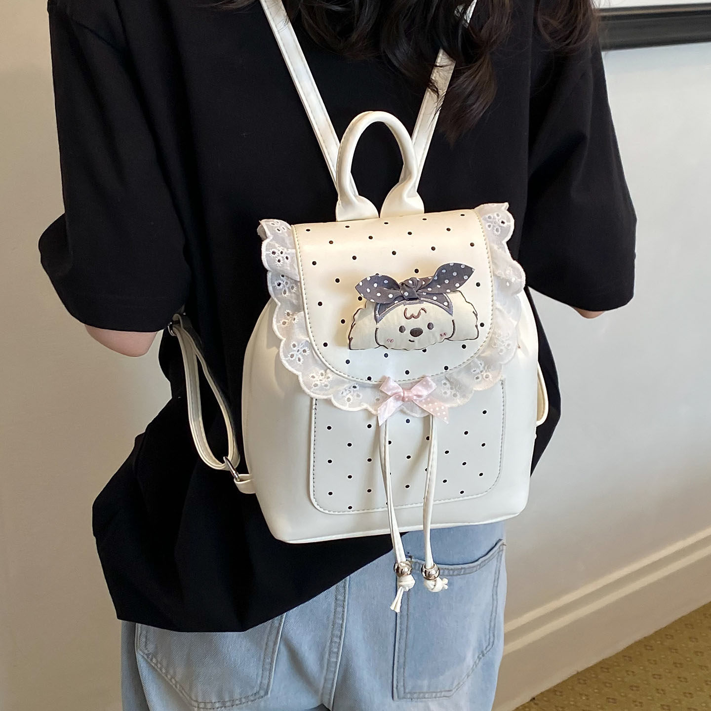 Mochila casual mochila de verano dibujos animados 2026 encaje versátil mochila escolar de mujer de viaje nuevo lindo punto de onda popular