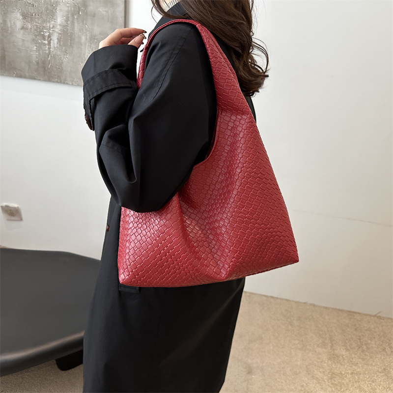 Otoño y invierno retro bolsos de dos piezas 2024, bolsos de moda de mujer, bolsos de hombro portátiles extranjeros, bolsos simples.