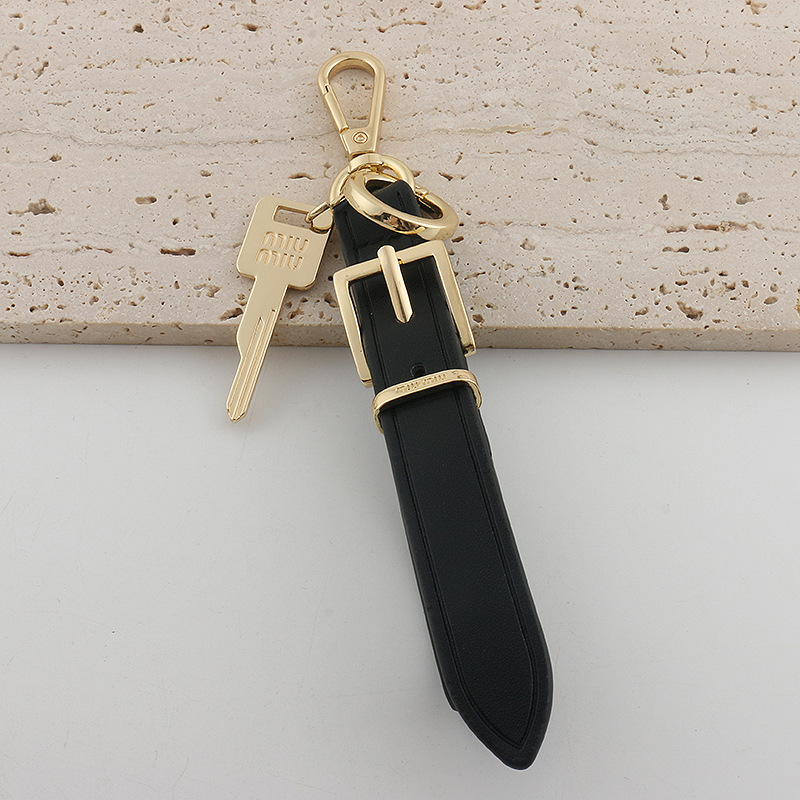 Xiaohongshu ins estilo explosivo uim caja de llaves de cuero colgante llavero de coche colgante pequeño de moda para hombres y mujeres