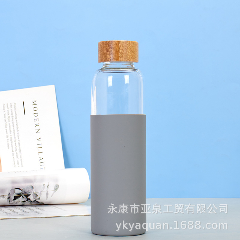 Suministro directo de fábrica Taza de vidrio con tapa de bambú transparente Taza de agua de vidrio de té de oficina de gran capacidad Taza de plástico transparente al por mayor