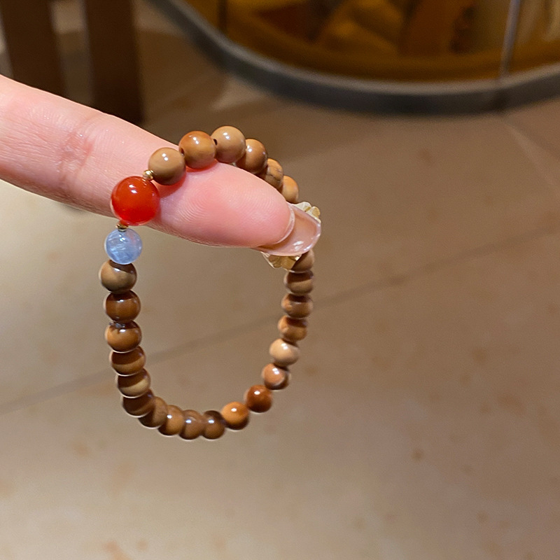 Pulsera de granate de ojo de tigre de cristal natural, nueva pulsera de todo fósforo de estilo nacional de estilo chino, joyería de novia de alta gama de lujo ligero