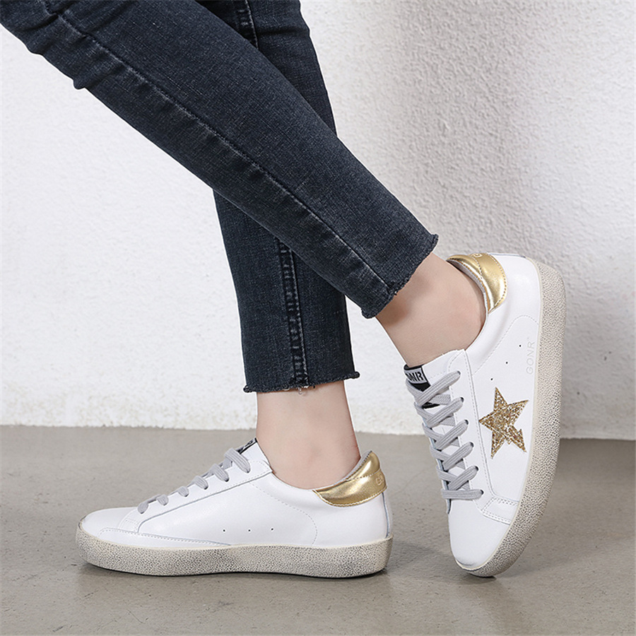 Zapatillas de deporte blancas pequeñas retro Harajuku multi-fósforo calle tiro estrella estudiante talla grande 44 pareja familia zapatos sucios exportación estilo caliente
