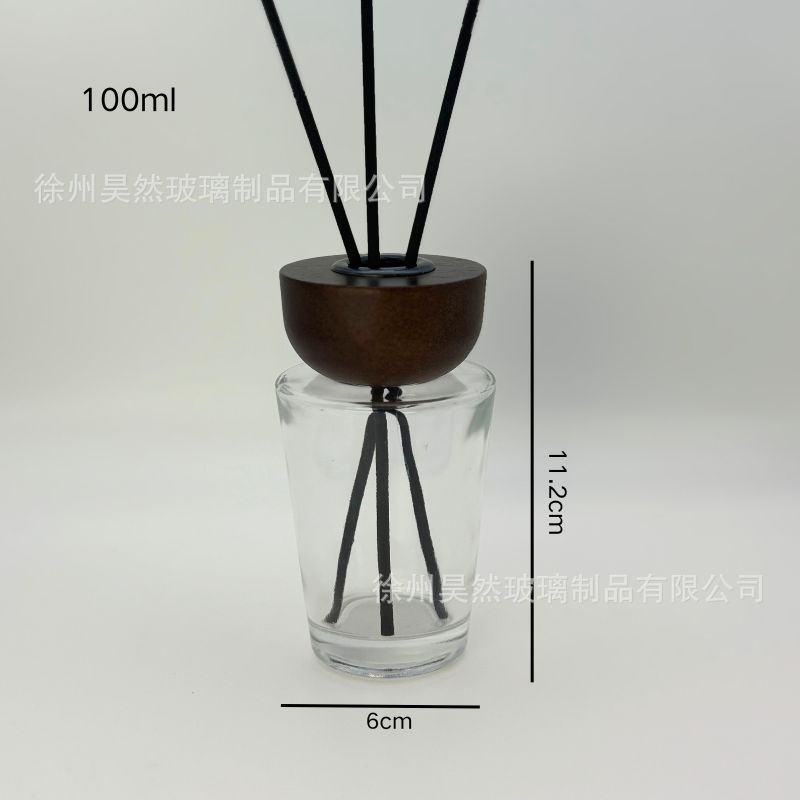 Botella vacía europea simple de alto valor nominal botella de fragancia de madera sólida botella de aceite esencial de caña cónica sin fuego 28 dientes botella de vidrio