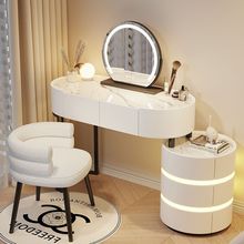 奶油风小户型卧室高级梳妆台简约现代岩板氛围灯化妆桌收纳一体柜