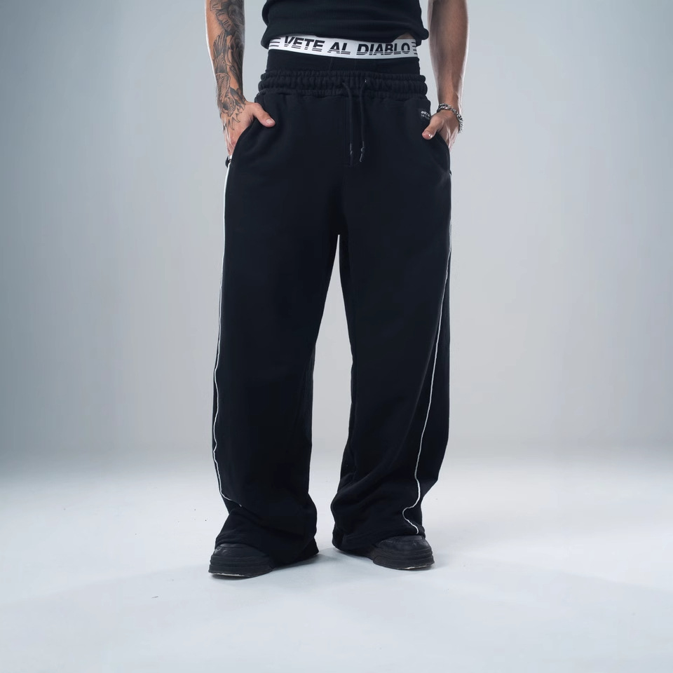 Pantalones deportivos casuales versátiles de pierna recta para otoño e invierno 2025, pantalones holgados retro de moda con costuras laterales de patchwork para hombre.