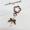 Brown keychain with bow, flowered