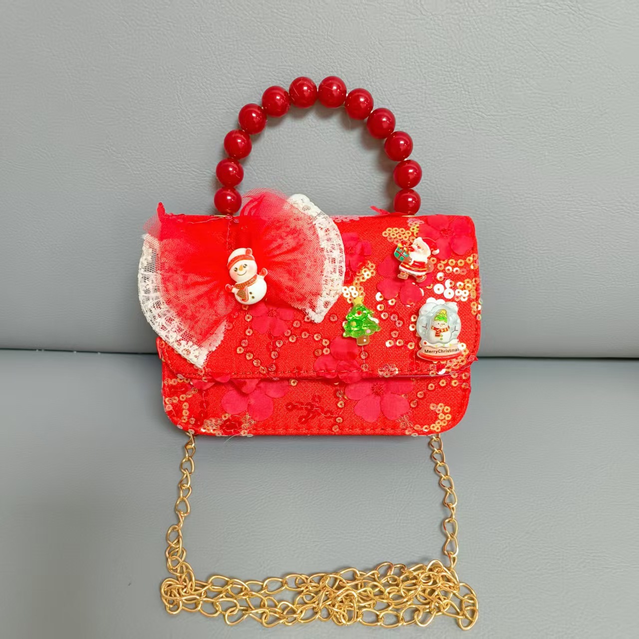 Cartera de Año Nuevo rojo arco de papá Noel bolso de perla pequeña cadena de viento fragante bolso de hombro