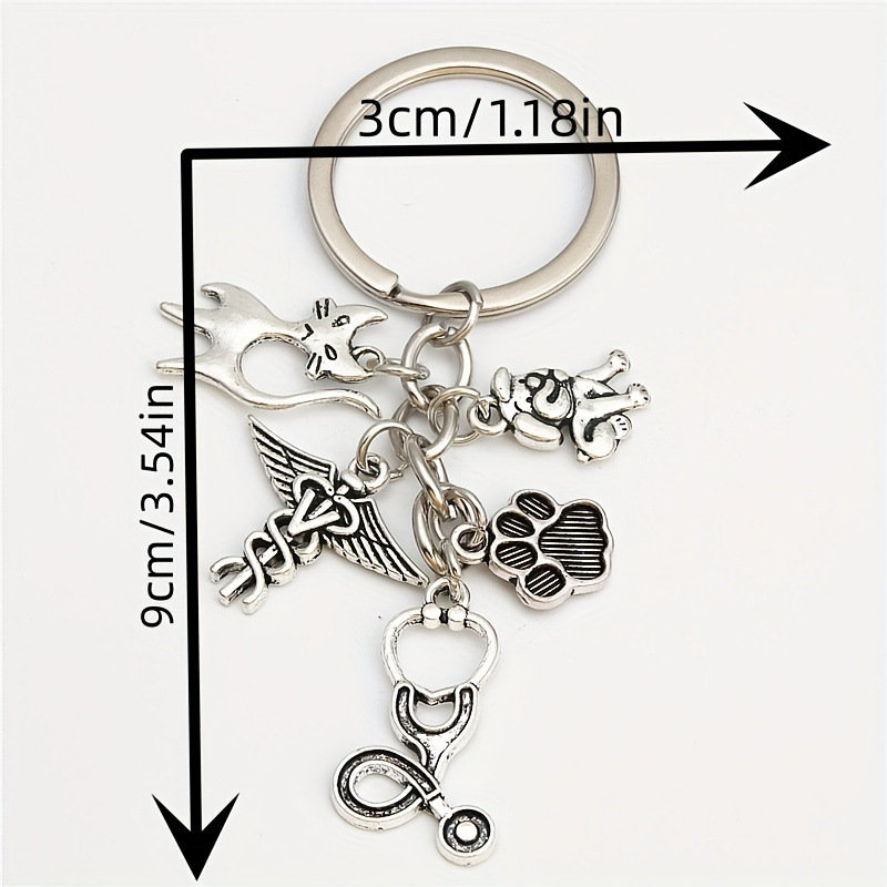 Serie de oro de aleación de venta transfronteriza caliente fútbol béisbol rugby sombrero hechicero puño llavero colgante mochila