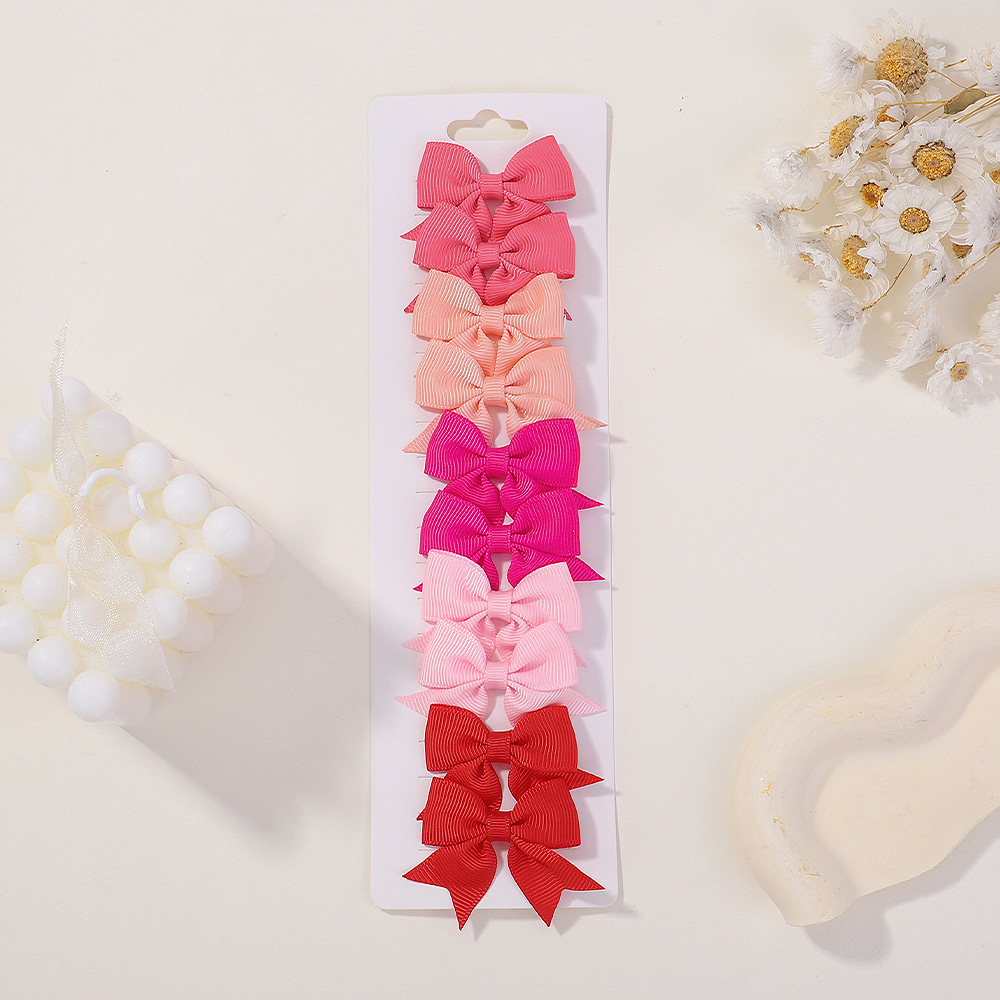 Juego de horquillas con lazo de cola de milano para niños de estilo caliente de Amazon, lindo y versátil, horquilla diaria para niñas europeas y americanas 323