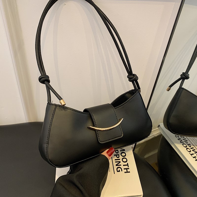 Bolso de axila de un solo hombro de estilo popular de nicho de alta gama para mujer 2025 primavera y verano nuevo bolso bandolera salvaje de moda