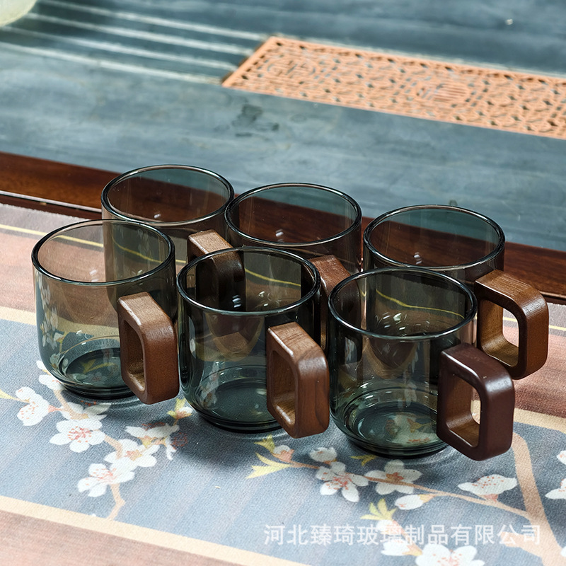 Taza de té de vidrio con asa de madera Taza de té pequeña para el hogar resistente a altas temperaturas Taza de té de hospitalidad de vidrio con alto contenido de borosilicato de hollín transparente personal