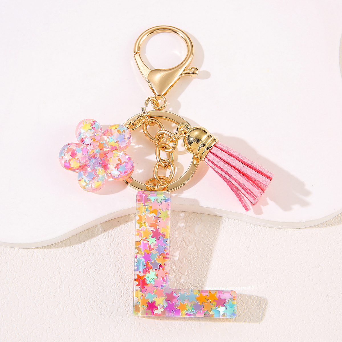 Un nuevo llavero flor de goteo de goma esquinilla 26 letras bolsos colgante llavero accesorios Yiwu