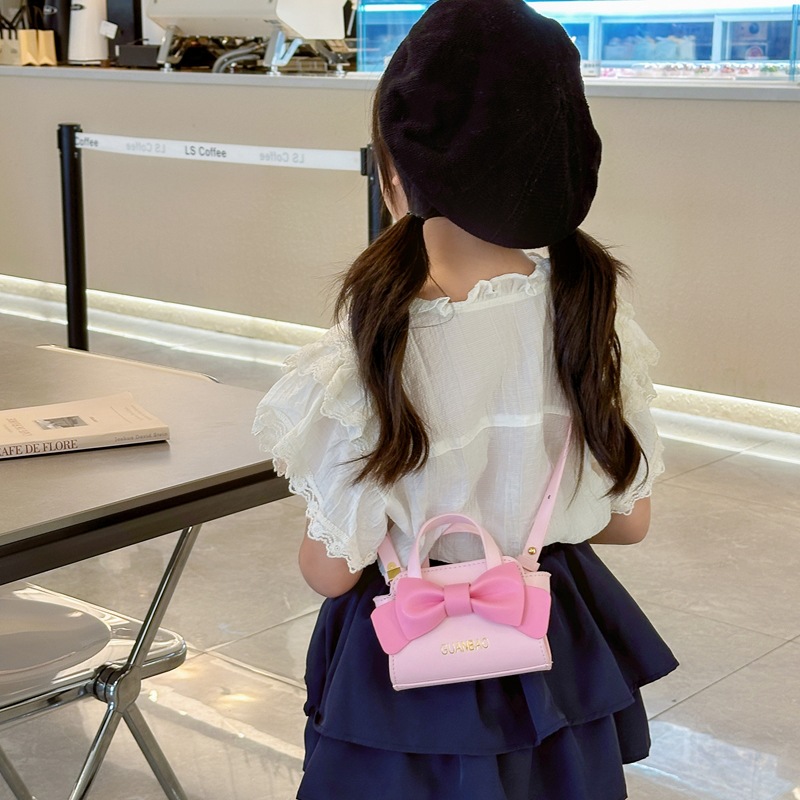 Nuevo tipo de bolso de hombro para niños y niñas, estilo coreano de moda, bolso de arco para niños 2024, bolso mini de estilo extranjero