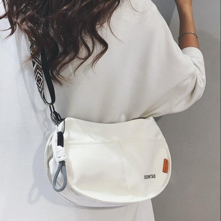 Japanese-Style Trendy Wide Shoulder Strap High-End Nylon Bag for Women Commuting to Work Saddle Bag Casual Versatile Crossbody Dumpling Bag Japanese-Style Trendy Wide Shoulder Strap High-End Nylon Bag for Women Commuting to Work Saddle Bag Casual Versatile Crossbody Dumpling Bag