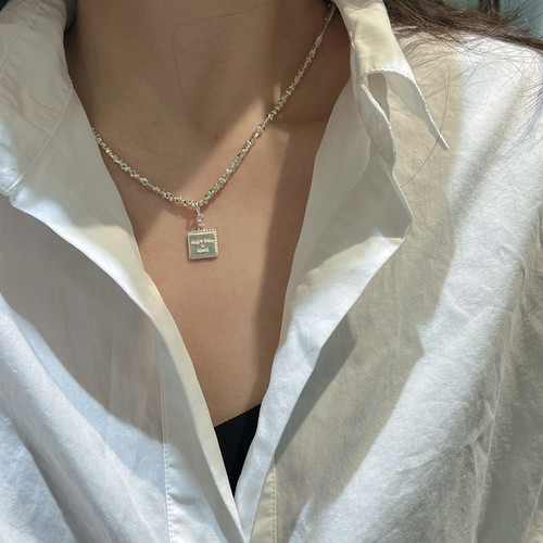 S925 sterling silver Korean version niche design white silver fashion pendant personality simple and fashionable heart-shaped letter side pendant