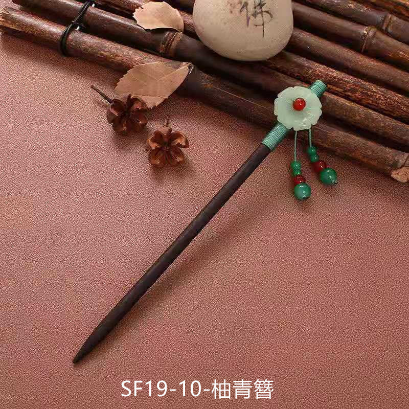 黒檀の木のかんざしのフリンジをまねて、かんざしの子供の古風な頭飾りをします。|undefined