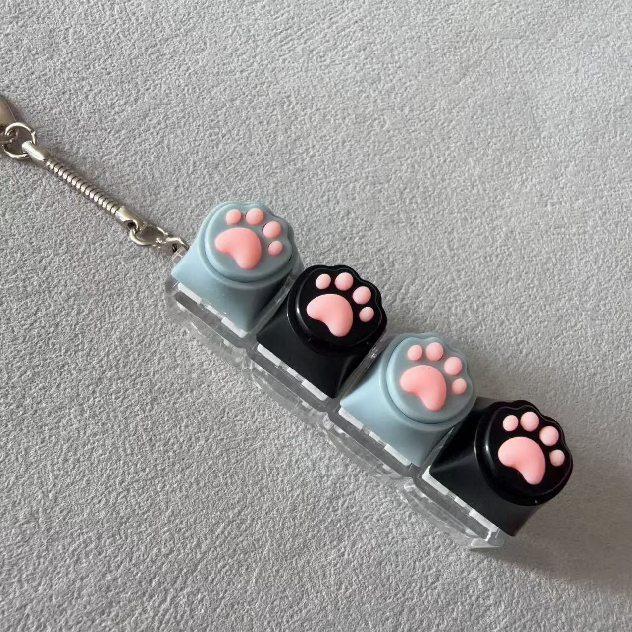 Four-button transparent case - silicone cat paw (gray
