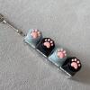 Four-button transparent case - silicone cat paw (gray