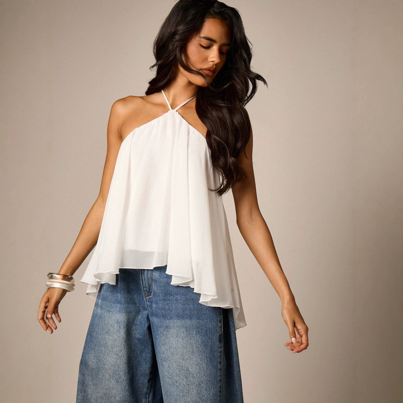 European and American cross-border best-selling halter-neck, backless, chiffon top for women, featuring a loose fit, ruffled hem, and a vacation-inspired, sleeveless design