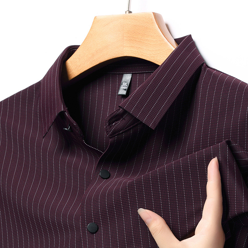Camisa sin costuras para hombres Primavera y otoño Nueva solapa a rayas camisa de manga larga de negocios jóvenes y de mediana edad sin planchar ropa superior para hombres