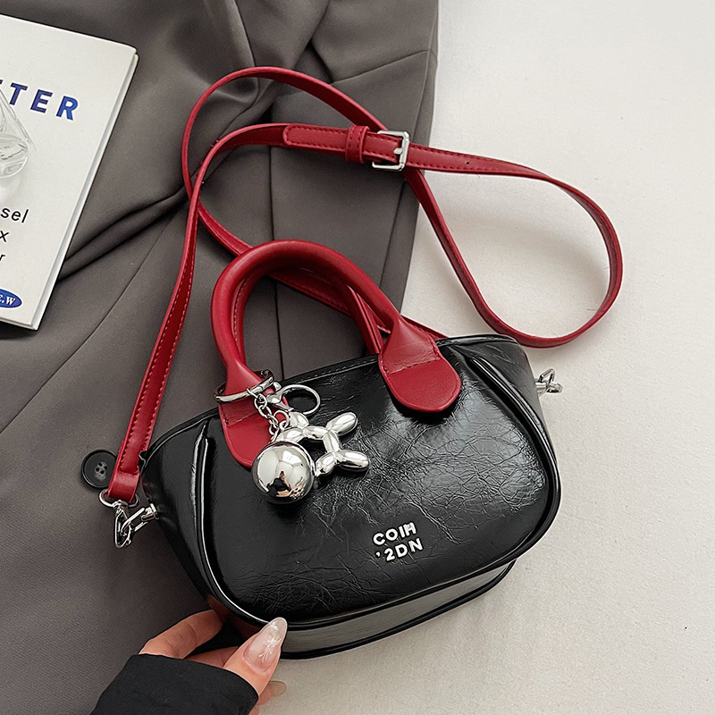 Alta sensación de contraste bolsos pequeños para mujeres 2024 nuevo verano popular bolsa de mensajero versátil Super Fire bolsa de cubo de mano