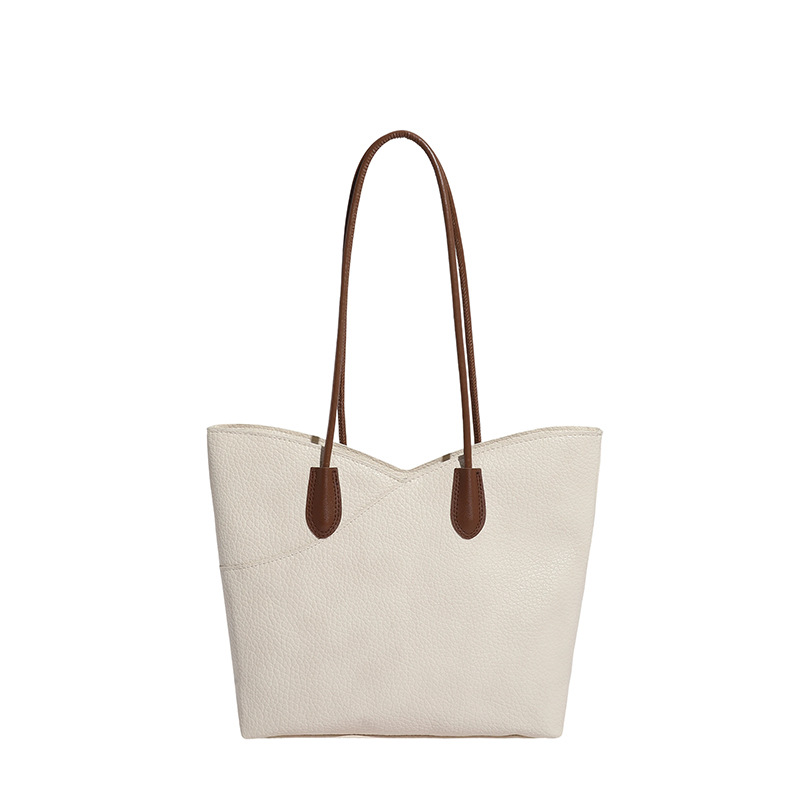 Bolsa de mano de textura superior para mujeres 2026 nicho transfronterizo bolso de hombro ligero de lujo de gran capacidad de viaje a la braza