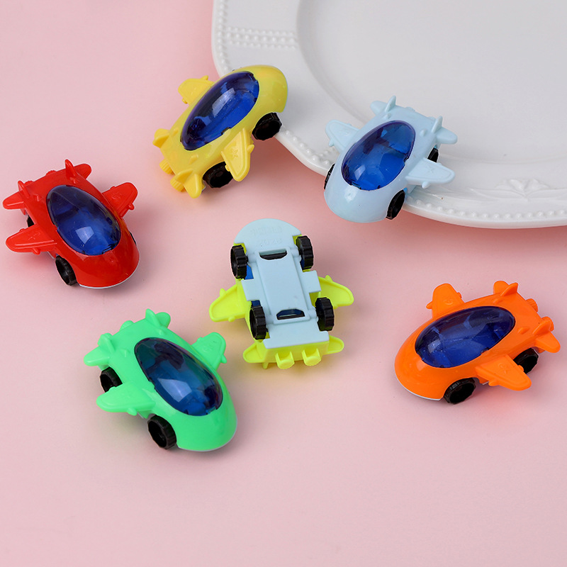 Deslizamiento de dibujos animados mini avión Juguete huevo juguete suerte dibujar pequeño juguete al por mayor WeChat empuje pequeño regalo