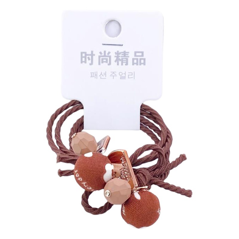 Otoño e invierno té de leche color paño bola cuerda del pelo 2 tarjetas leopardo cabeza cuerda simple hilo colgando bola banda de goma 2 yuanes tienda de suministro