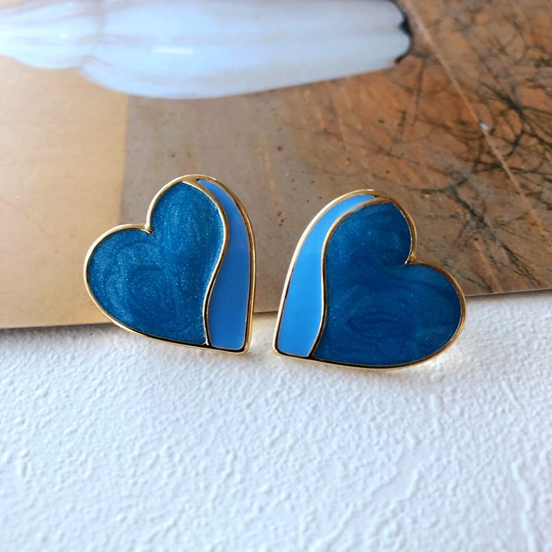 Nihaojewelry Jewelry Wholesale Enamel Glaze Flower Stitching Blue Heart Stud Earrings display picture 1
