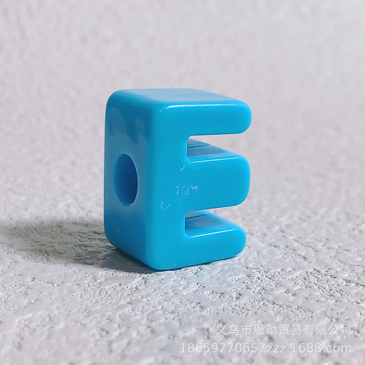 E (blue)