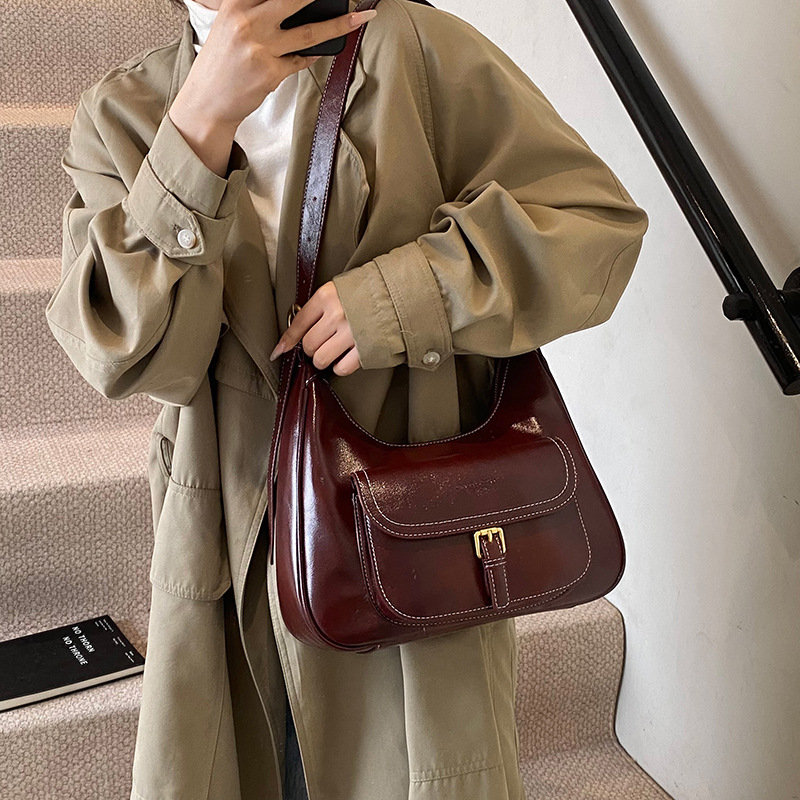 Bolsos retro de piel de cera de alta sensibilidad, bolsas de mujer 2025, nuevo otoño y invierno, bolsas de hombro y brazo.