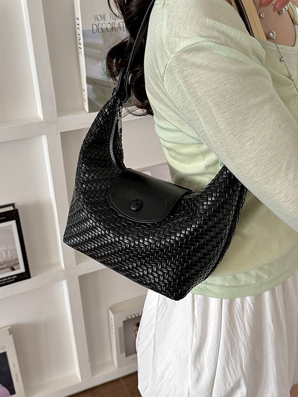 Nicho coreano tejido bolso de brazalete, bolso para mujeres 2026 nueva moda lujosa ligera, holgazante, bolso de mochila versátil