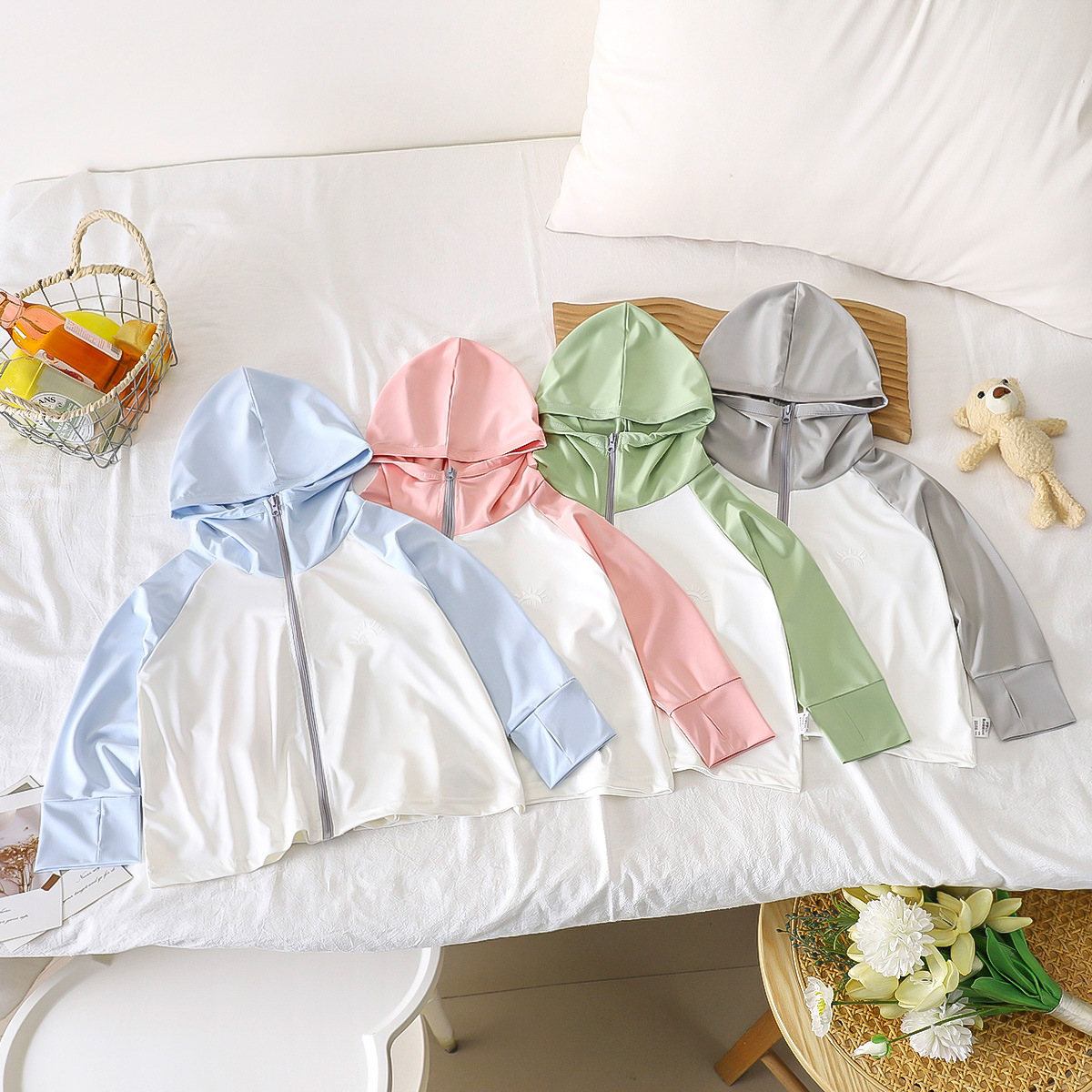 Ropa de protección solar para niños verano nuevo estilo niña fina seda de hielo protección UV niños chaqueta de protección solar con capucha ropa para niños