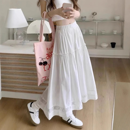 White lace-trimmed half skirt with A-line large hem, loose-fitting high-waisted, suitable for summer with French style.