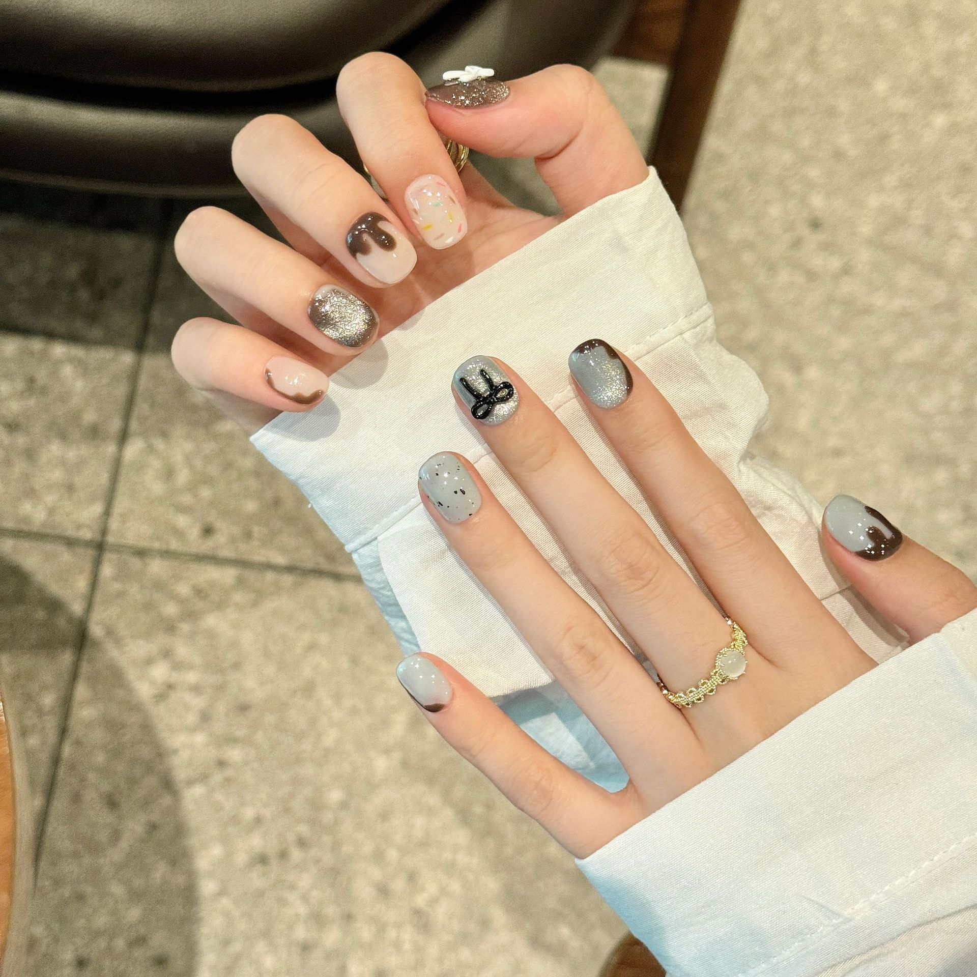 Armadura de vestir hecha a mano, arco tridimensional hecho a mano, ojo de gato, diseño de nicho, temperamento blanco, uñas de uñas, uñas de vestir