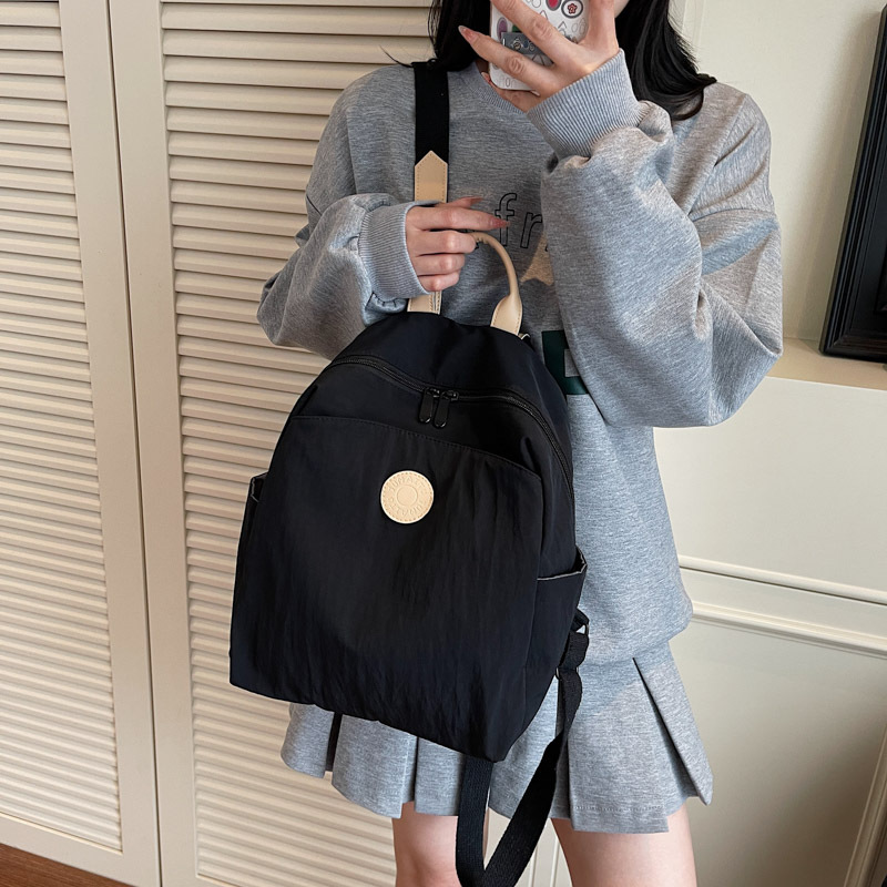 Bolsa de estudiantes de moda coreana para mujeres 2025, verano, nueva moda, mochila casual de gran capacidad, bolso de viaje simple para mujeres