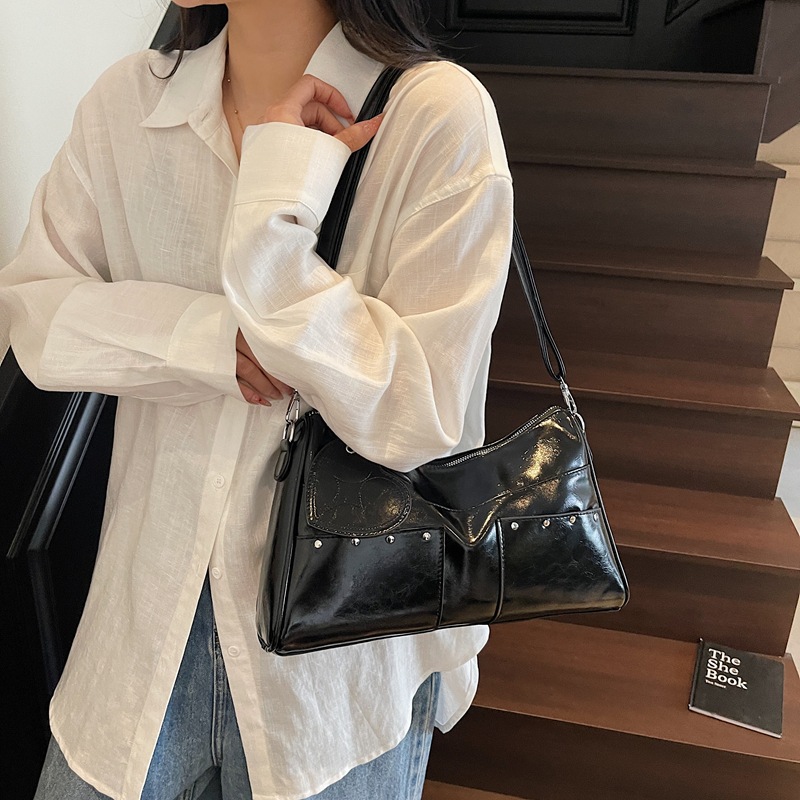 Bolso grande retro estilo Hong Kong 2025 verano nuevo bolso femenino bolso de hombro con textura transfronteriza bolso de mensajero con estampado de leopardo de alta calidad