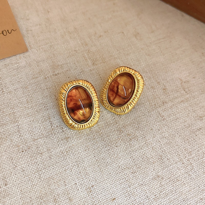 Retro Merrade curry plata aguja pendientes de moda versátil Hong Kong aretes de estilo ligero lujo alta sensación otoño invierno pendientes