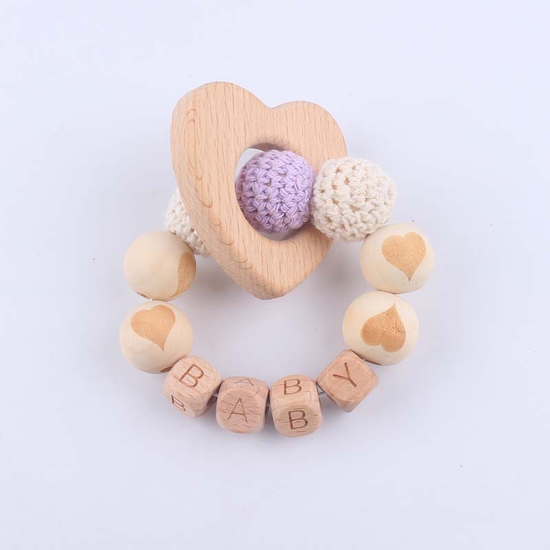 Bebé suministros de dibujos animados de haya amor mordedor creativo DIY dibujos animados amor patrón mordedura pulsera teether juguete